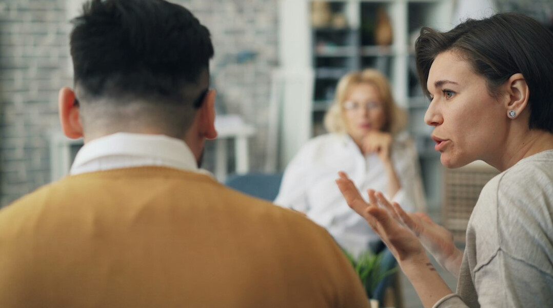 two people talking calmly